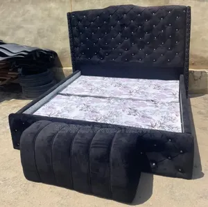 6 by 6 Upholstery Bottoned Bedframe With an Ottoman