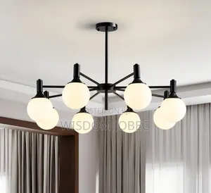 Modern Chandelier Features a Matte Black Frame With Smoke Glass