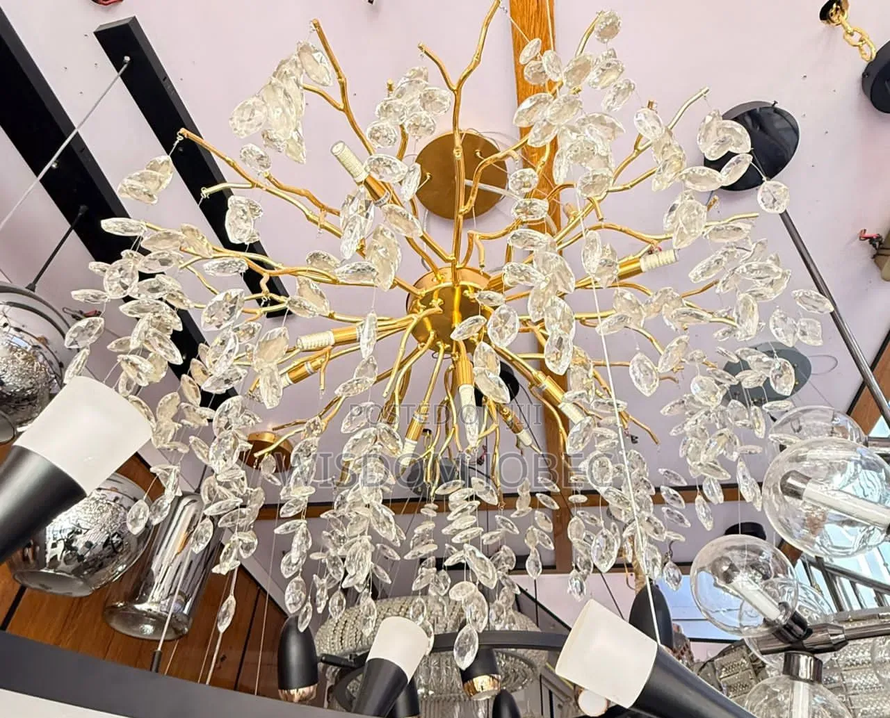 Modern Chandelier Features a Matte Black Frame With Smoke Glass