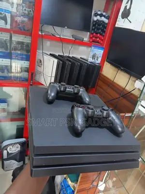 Uk Used Ps4 Pro || 2 Pads || 10 Games