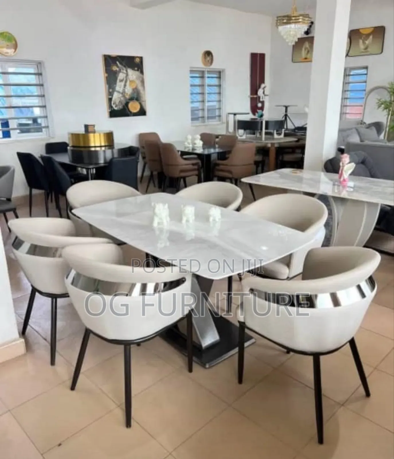 A Unique Marble Dinning Table With 6 Beautiful Design Chairs.