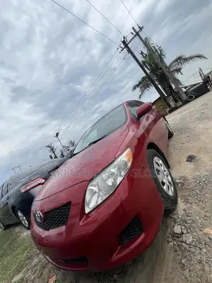 Toyota Corolla LE 4dr Sedan (1.8L 4 cyl 4A) 2009 Red