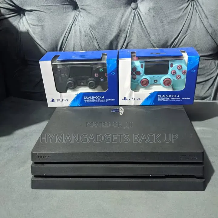 Uk Used Ps 4 Pro With 2 Pads and 10 Licenced Games Including Fc 26