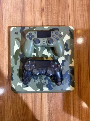 Uk Used Ps4 Slim 1tb 2pads Fc26 10games