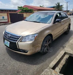 Toyota Avalon XL Sedan FWD ( 3.5L 6cyl 6A) 2008 Gold