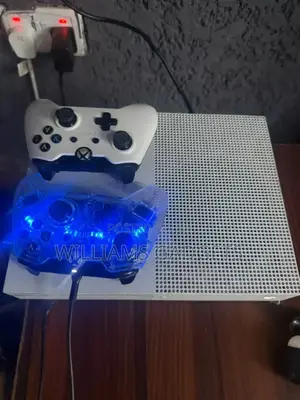 Xbox One S 1tb With 22 Games With Two Wired Pad