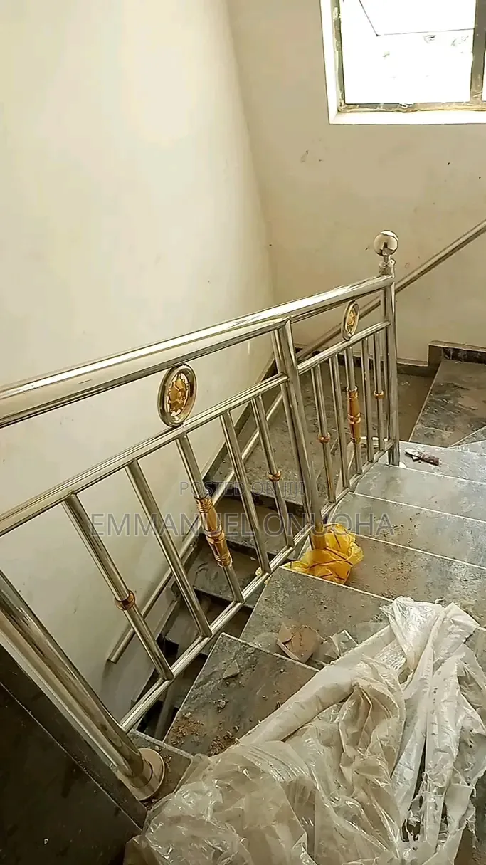 A Modern Stainless Steel Staircase Handrail