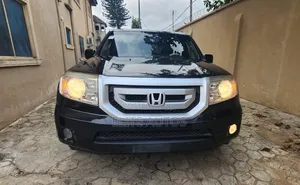 Honda Pilot EX-L 4dr SUV 4WD (3.5L 6cyl 5A) 2011