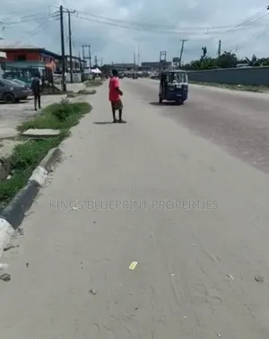 Commercial Land of 150 by 150 Along Warri Sapele Road Warri