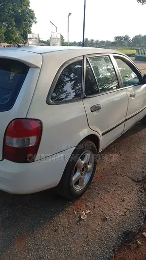 Mazda 323 1999 White