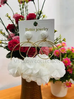 White Floral Hoop Earrings – Elegant Statement Jewelry