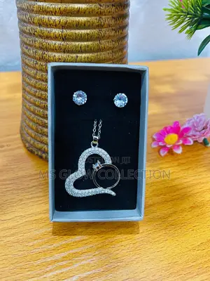 Love Sharped Necklaces Set With Ring Attached to It