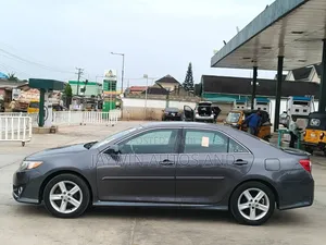 Toyota Camry SE Sport 4dr Sedan w/Prod. End 11/13 (2.5L 4cyl 6A) 2014