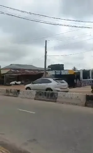 Half Plot of Land With Demolishable Building Facing Ekoro Road