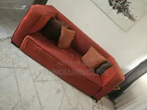 An Orange 3-Seater Sofa