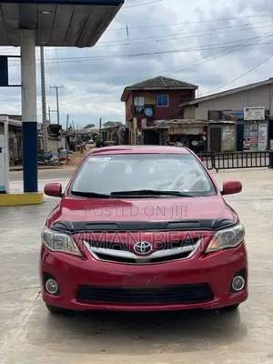 Toyota Corolla LE 4dr Sedan (1.8L 4cyl 4A) 2013 Red