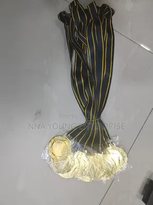Gold-colored Metal Medal