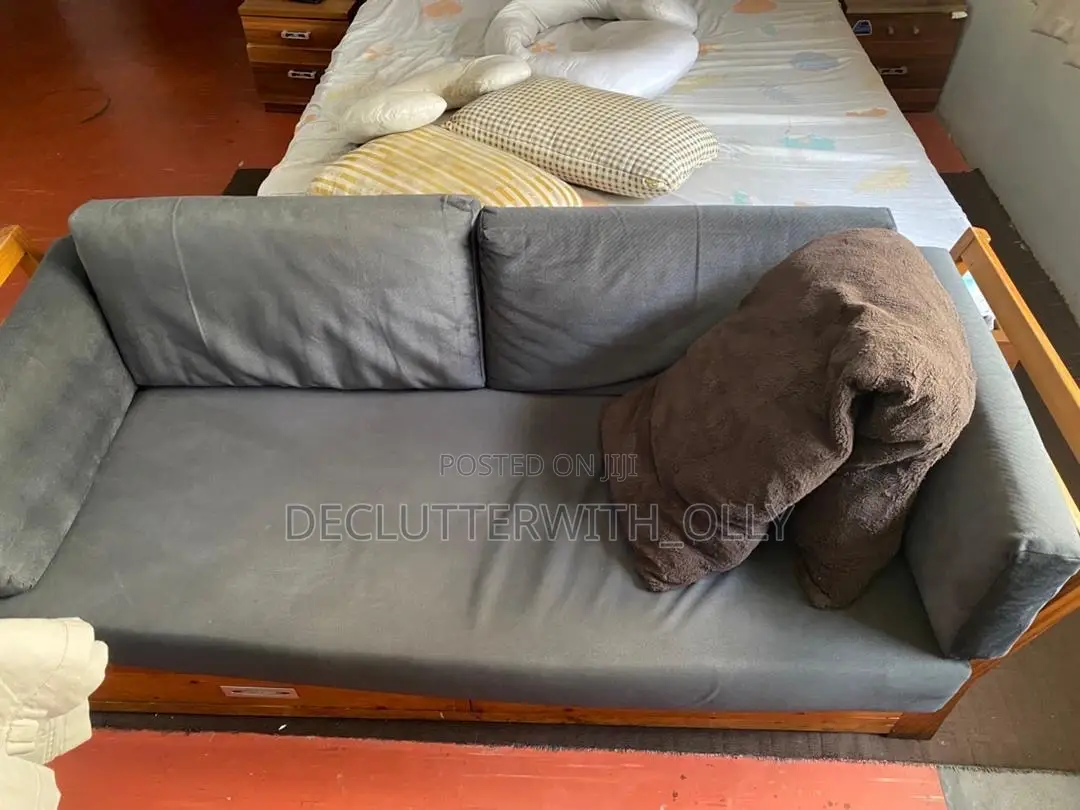Two Wooden Sofas