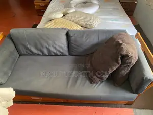 Two Wooden Sofas