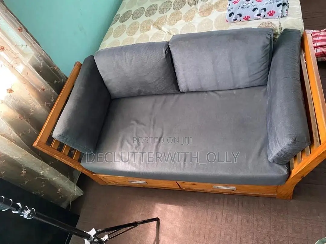 Two Wooden Sofas