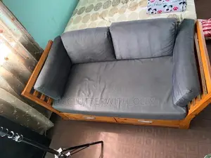 Two Wooden Sofas