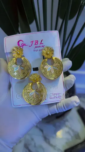 Non Tarnish Earrings And Pendant With Two Years Guarantee