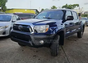 Toyota Tacoma V6 4dr Access Cab 4WD 6.1 ft. SB (4.0L 6cyl 5A) 2014 Blue