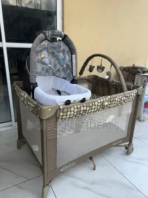 Graco Baby Cot With Extra Bassinet and Baby Rattles