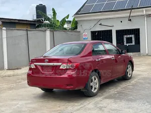 Toyota Corolla LE 4dr Sedan (1.8L 4cyl 4A) 2013 Red