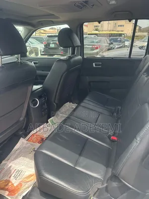Honda Pilot Touring w/RES/Navi 4WD (3.5L 6cyl 5A) 2013 White