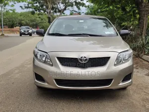 Toyota Corolla LE 4dr Sedan (1.8L 4cyl 4A) 2010 Gold
