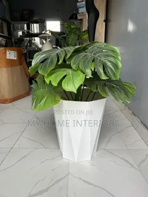 White Planter With Flower
