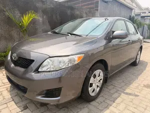 Toyota Corolla Base 4dr Sedan (1.8L 4cyl 5M) 2009 Gray