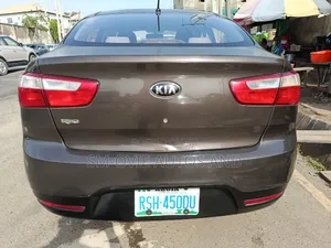 Kia Rio EX 4dr Sedan (1.6L 4cyl 6A) 2014 Brown