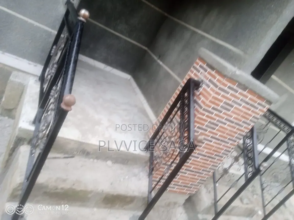 Wrought-Iron Handrail With Brown Ball