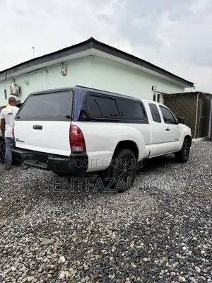 Toyota Tacoma Access Cab 4x4 2.7L 4-Cyl. 4-Speed Automatic 2013 White