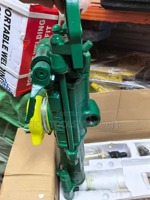 Air Leg Pneumatic Rock Drill or Jackhammer.