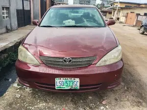 Toyota Camry LE 4dr Sedan (2.4L 4cyl 5M) 2004 Red