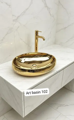 Elite Glossy Gold Oval Art Basin | Premium Tabletop Ceramic Washbasin