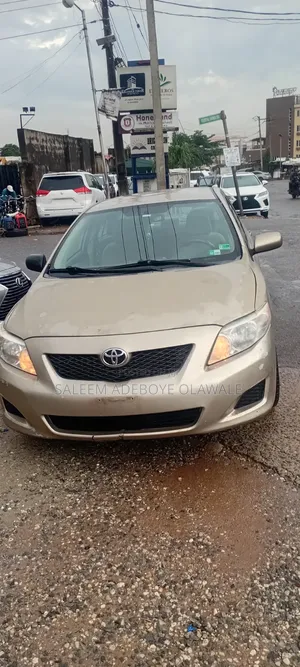 Toyota Corolla LE 4dr Sedan (1.8L 4cyl 4A) 2010 Gold