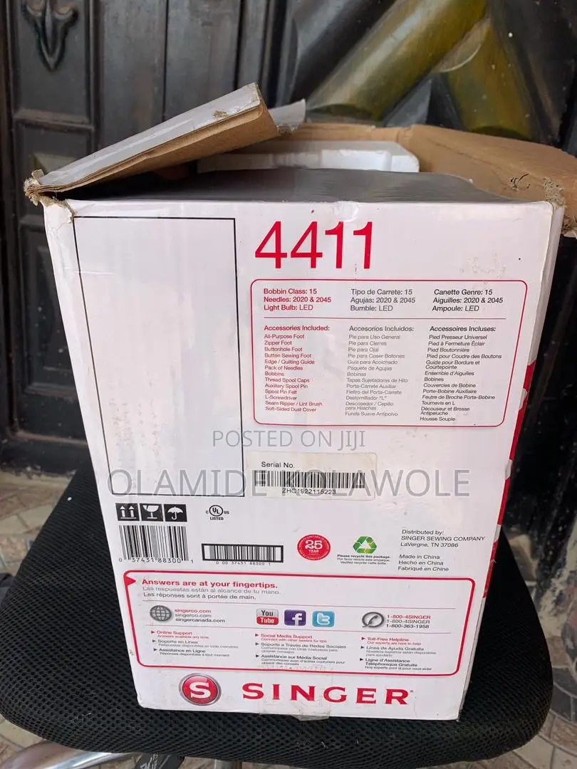 An Opened Box Of Singer Heavy Duty 4411 High-speed Sewing Machine