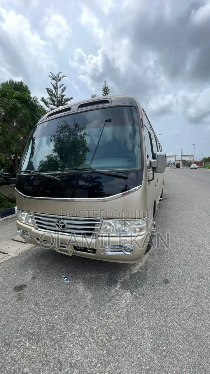 Toyota Coaster 2017 Gold
