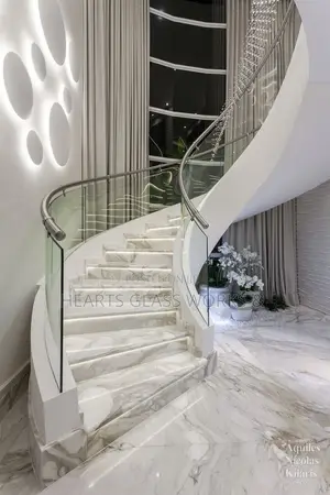 The Grand Curve Custom Glass Staircase