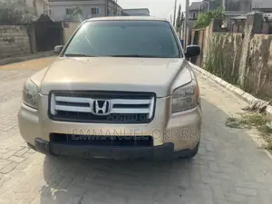 Honda Pilot LX 4x4 (3.5L 6cyl 5A) 2006 Gold
