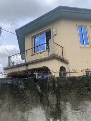 A Story Building on a Corner Piece of Land for Lease 80% Open Floor