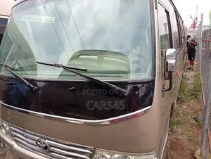 Toyota Coaster 2017 Gold