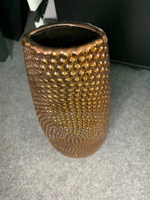 Tall Copper Dimpled Vase – Glossy Statement Piece