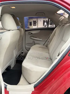 Toyota Corolla L 4dr Sedan (1.8L 4cyl 5M) 2013 Red