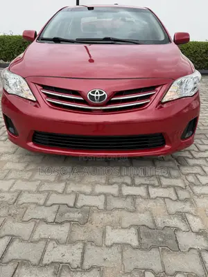 Toyota Corolla L 4dr Sedan (1.8L 4cyl 5M) 2013 Red