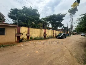 Land Measuring 1998sqm With a Demolishable Structure
